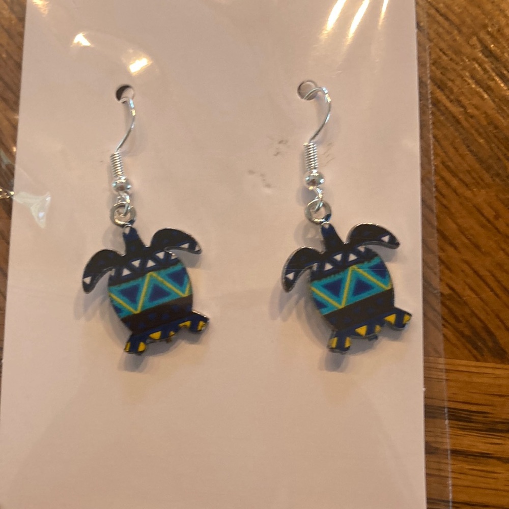 16.    “Turtle” earrings.
